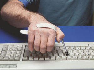 Keyboard-Typing Aid with Hand Clip